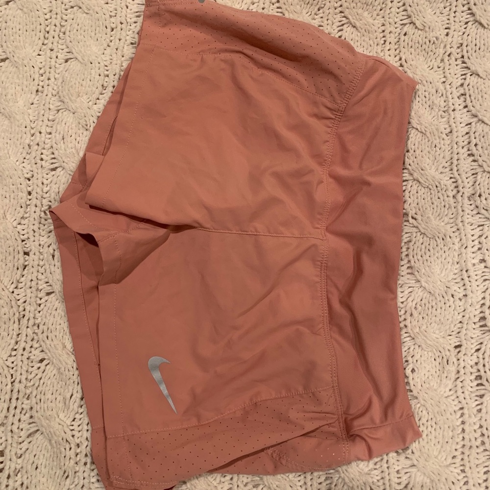 Blush women’s Nike running shorts